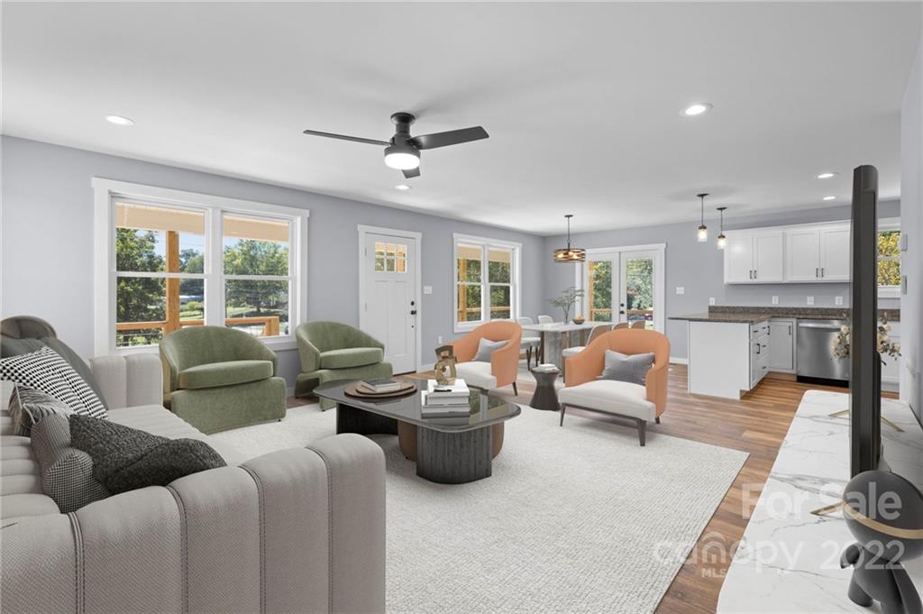 8 Split Rail Drive Asheville, NC 28806 - Photo 6 of 24 a living room with furniture ceiling fan and a rug