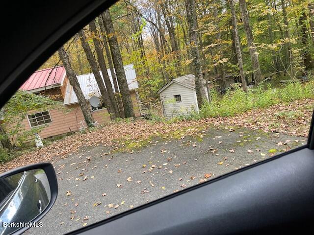 23 Judd Road Otis, MA 01253 - Photo 5 of 21 a view of a yard with a tree