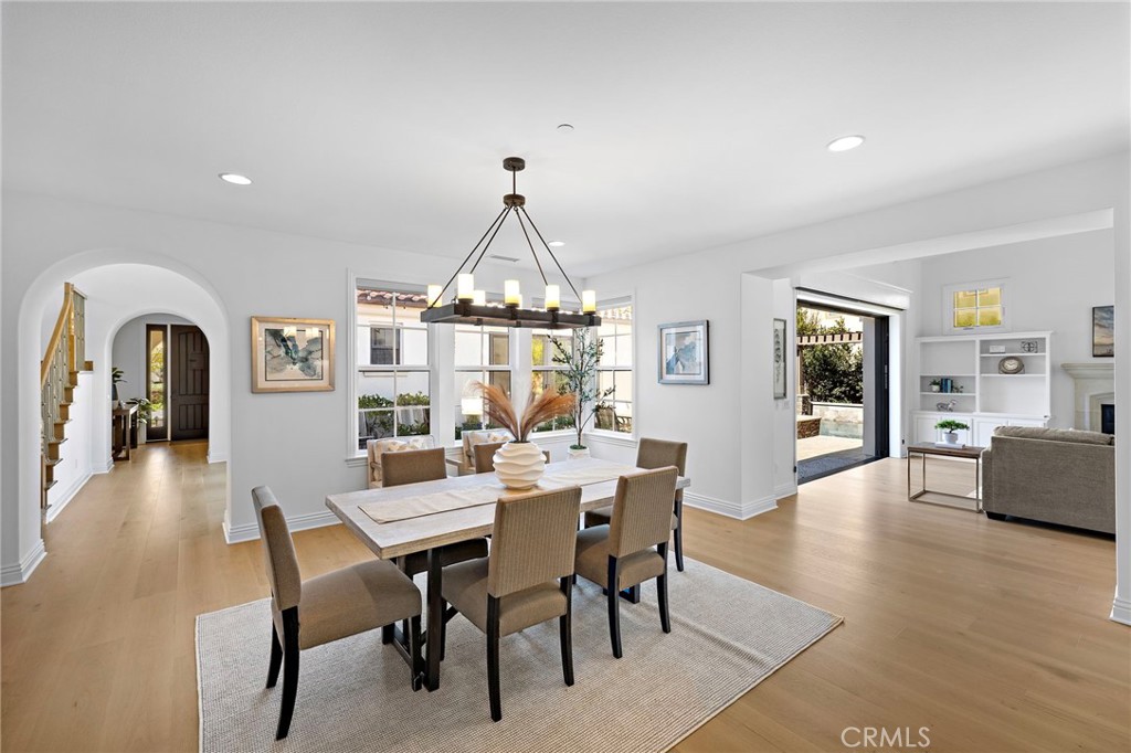 4 Gaucho Road Ladera Ranch, CA 92694 - Photo 14 of 40 a view of a dining room with furniture window and wooden floor