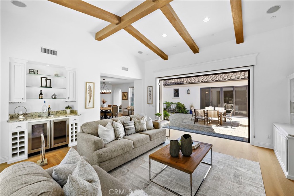 4 Gaucho Road Ladera Ranch, CA 92694 - Photo 16 of 40 a living room with furniture and a large window