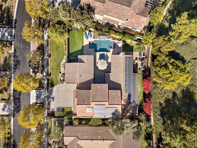an aerial view of a house with a garden
