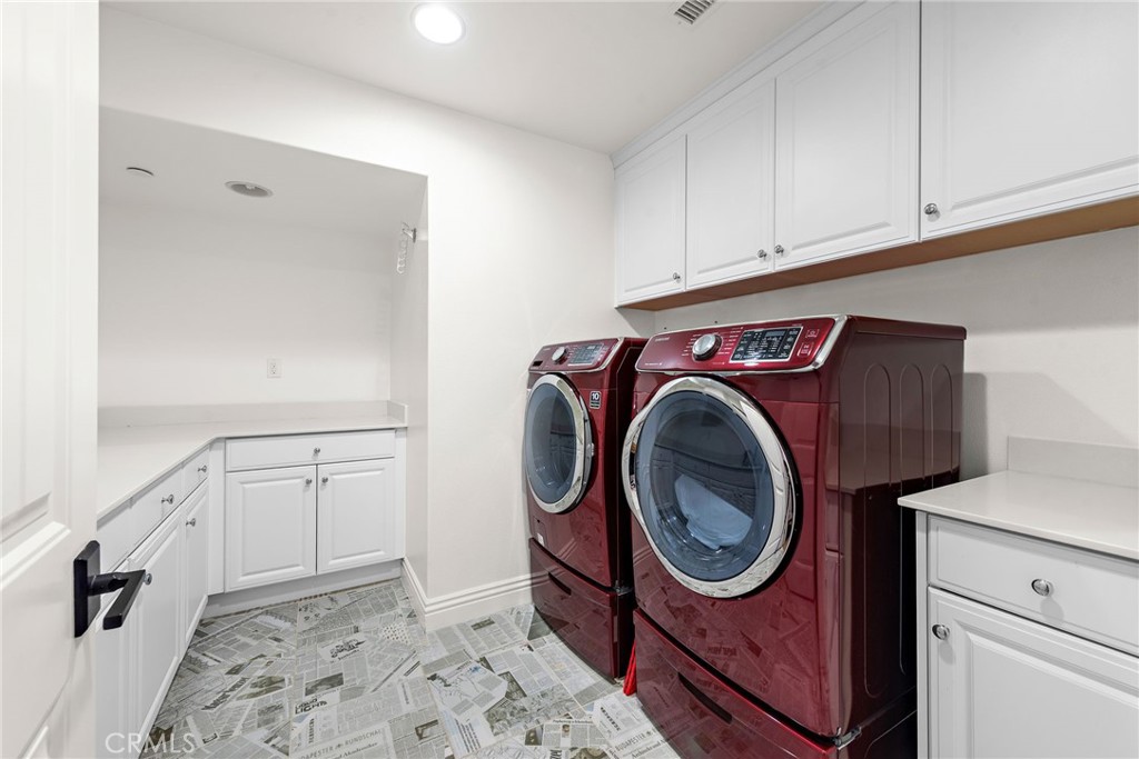 4 Gaucho Road Ladera Ranch, CA 92694 - Photo 26 of 40 a utility room with sink dryer and washer