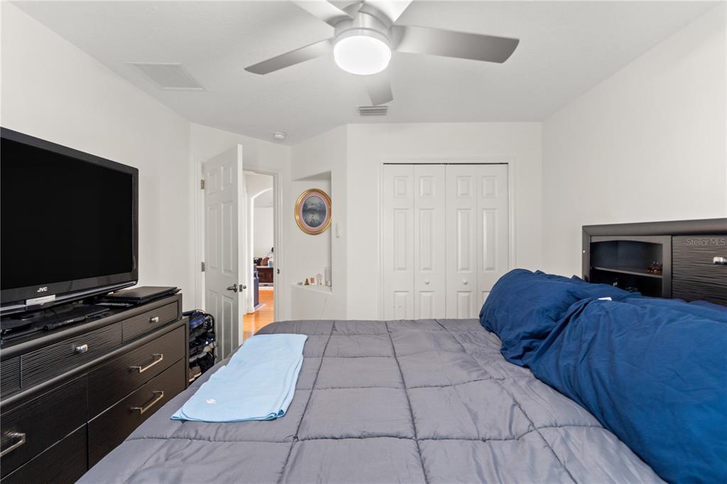 15819 Southwest 13th Circle Ocala, FL 34473 - Photo 20 of 34 a living room with furniture and a flat screen tv