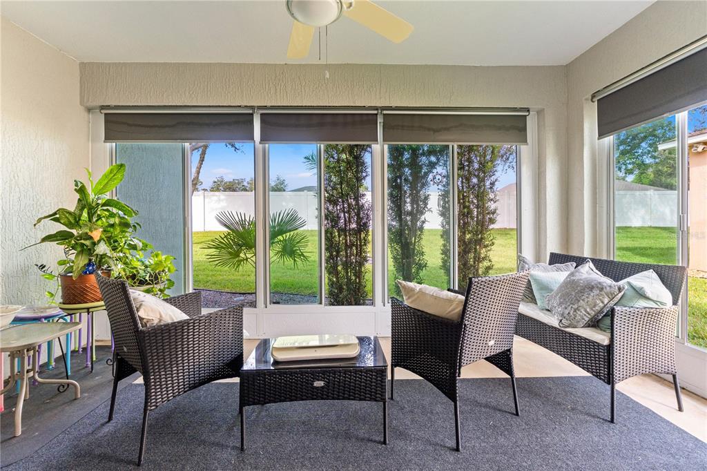 15819 Southwest 13th Circle Ocala, FL 34473 - Photo 3 of 34 a living room with furniture and a window