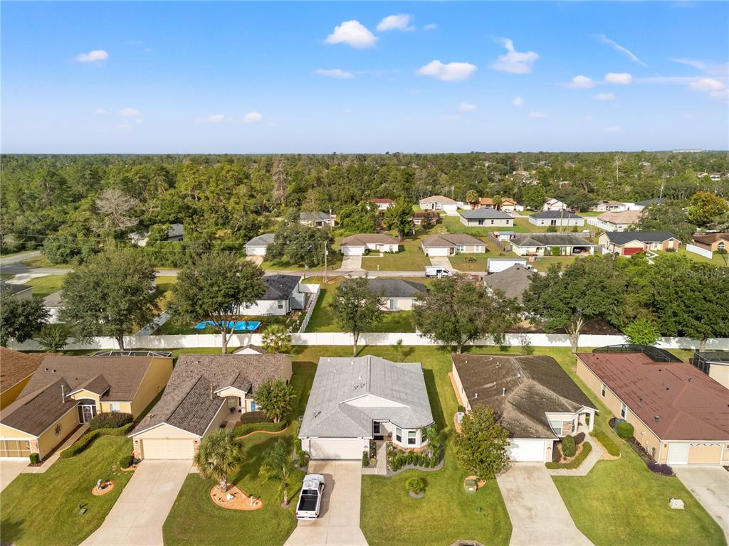 15819 Southwest 13th Circle Ocala, FL 34473 - Photo 32 of 34 an aerial view of residential houses with outdoor space