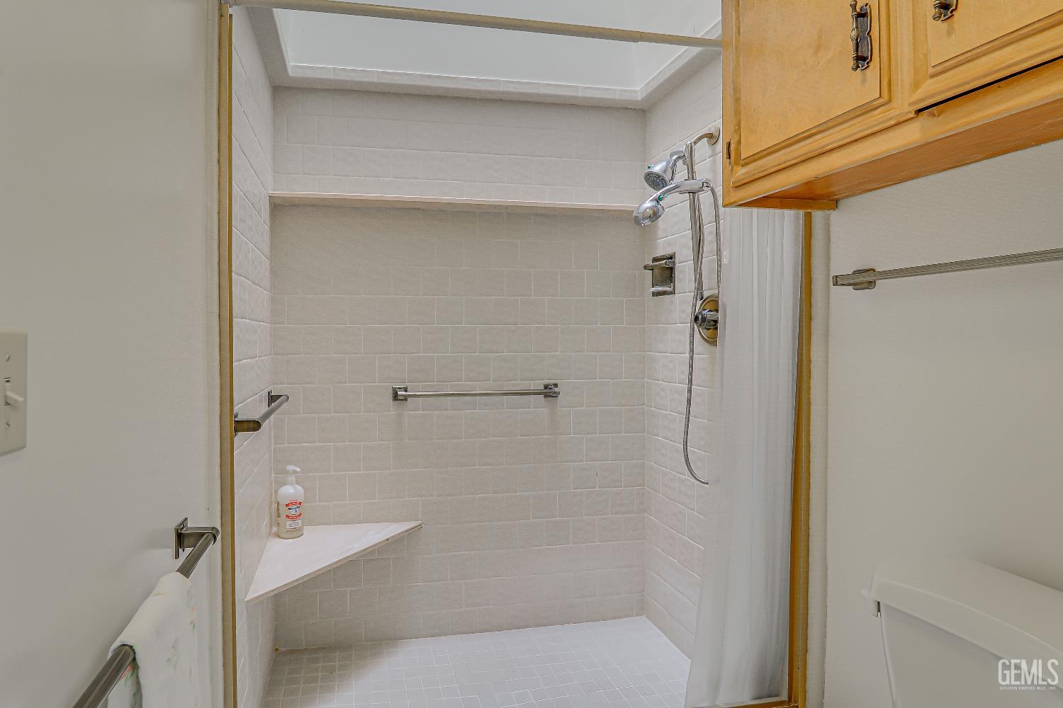 Undisclosed Address Bakersfield, CA 93309 - Photo 21 of 37 a bathroom with a shower