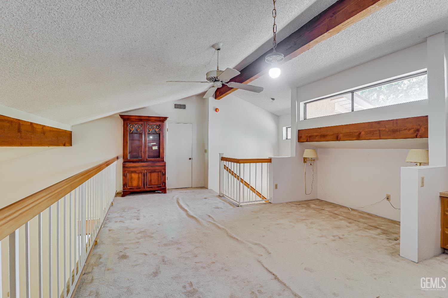 Undisclosed Address Bakersfield, CA 93309 - Photo 24 of 37 a view of a hallway with stairs