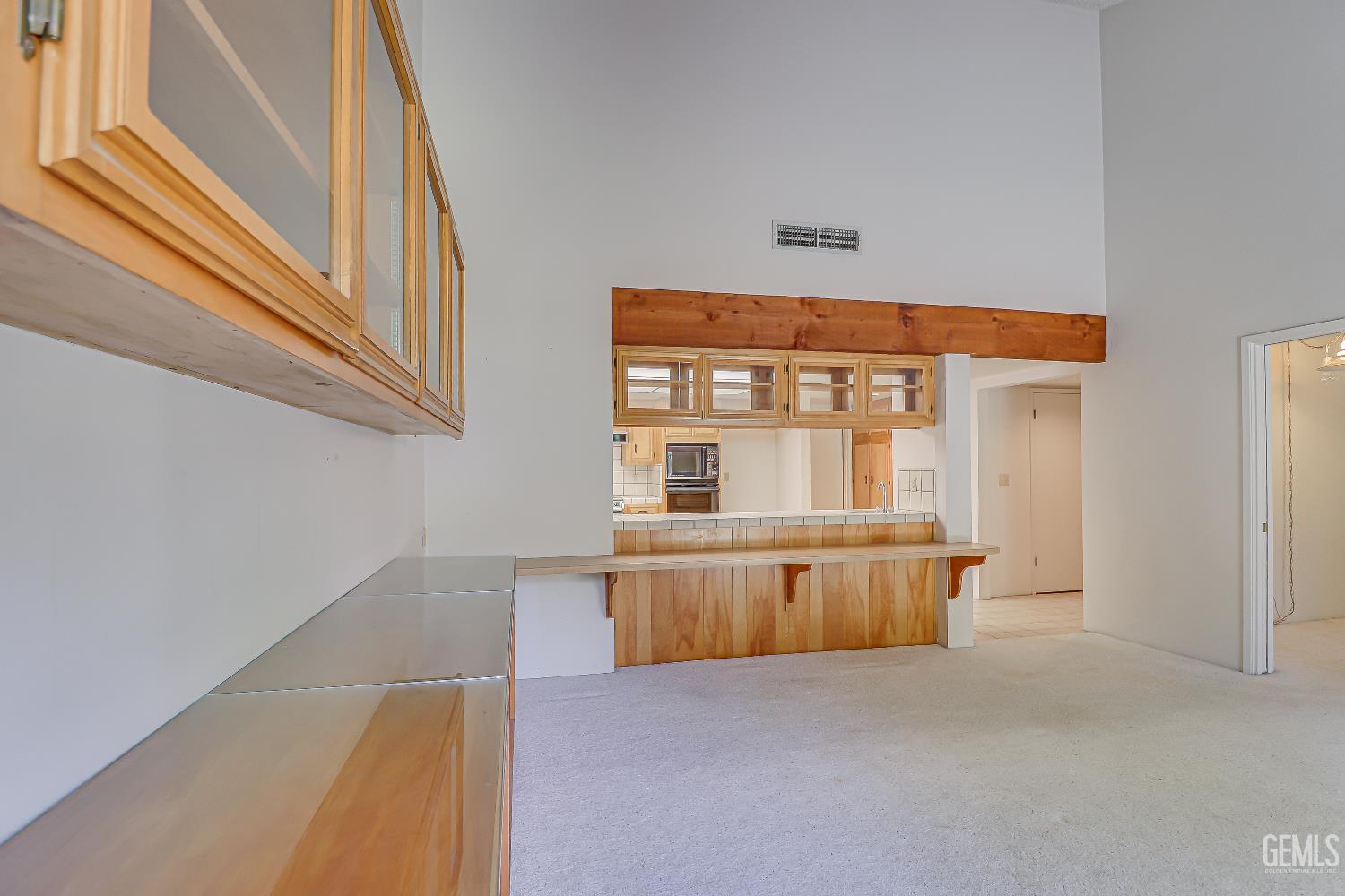 Undisclosed Address Bakersfield, CA 93309 - Photo 30 of 37 wooden floor in an empty room with a window