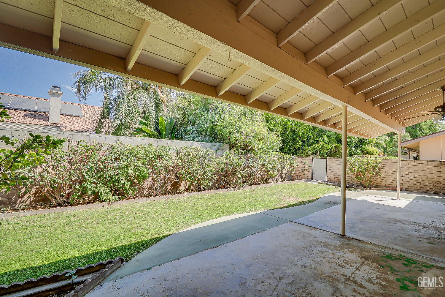Undisclosed Address Bakersfield, CA 93309 - Photo 37 of 37 a view of a backyard with pathway