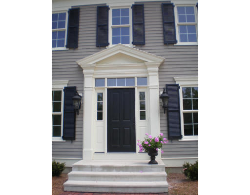 Lot 2 Adams Road Grafton, MA 01519 - Photo 4 of 26 a front view of a house with a window