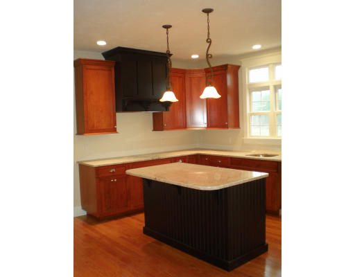 Lot 2 Adams Road Grafton, MA 01519 - Photo 8 of 26 a room with a sink vanity and mirror