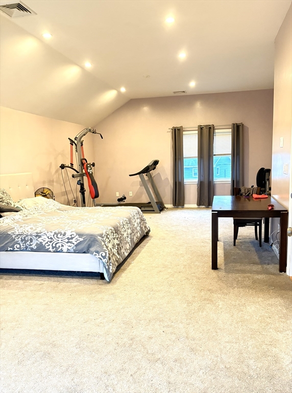 63 Doonan Street Medford, MA 02155 - Photo 11 of 15 a bedroom with a bed and walk in closet