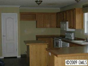 819 Armory Road Chester, SC 29706 - Photo 2 of 6 a kitchen with a sink and cabinets