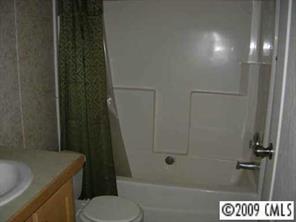 819 Armory Road Chester, SC 29706 - Photo 6 of 6 a bathroom with a shower and toilet