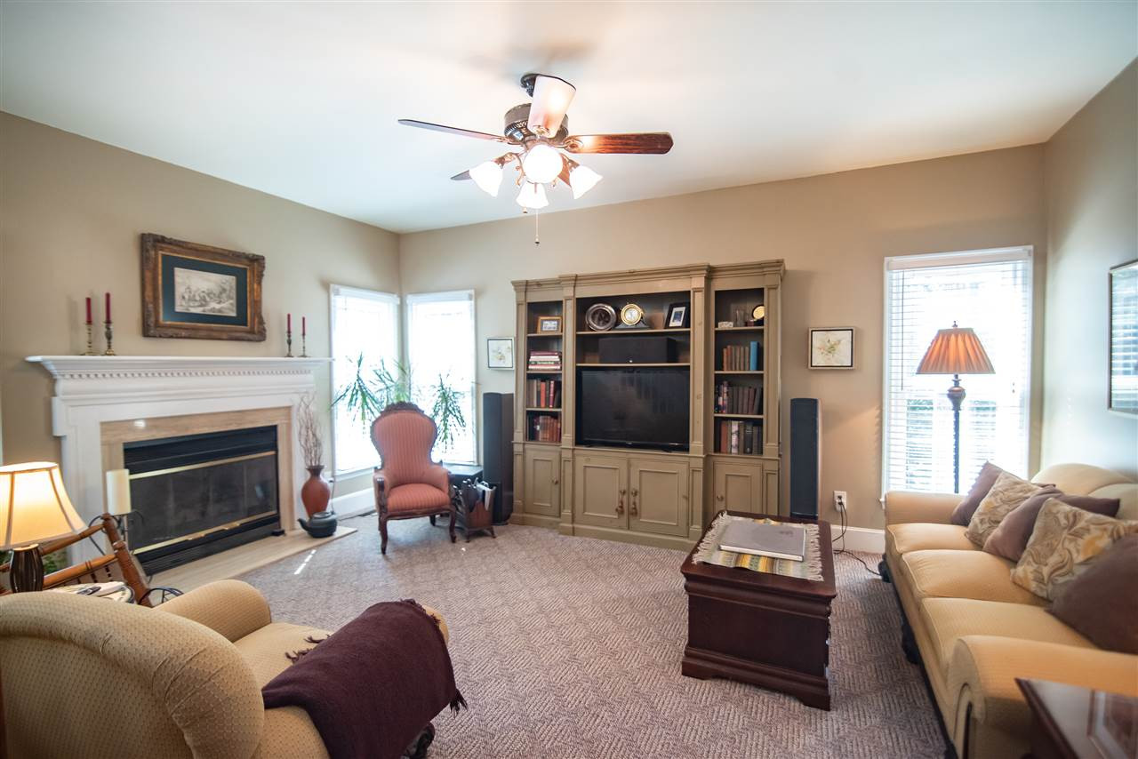 9716 Talman Court Raleigh, NC 27615 - Photo 11 of 30 Sunlight shines through the double pane windows. Family Room