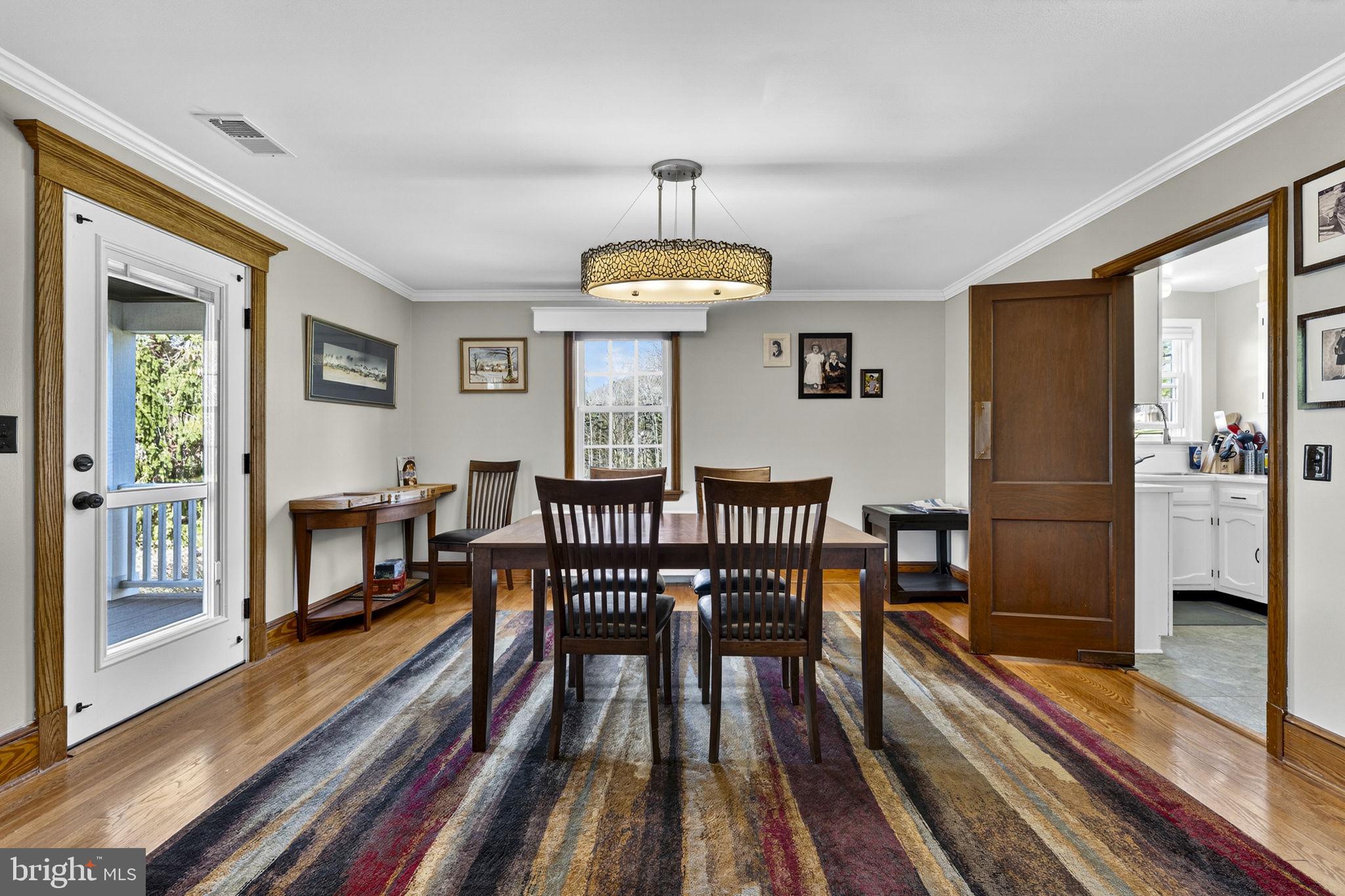 653 Federal Street Paris, VA 20130 - Photo 14 of 64 a view of a dining room with furniture window and wooden floor