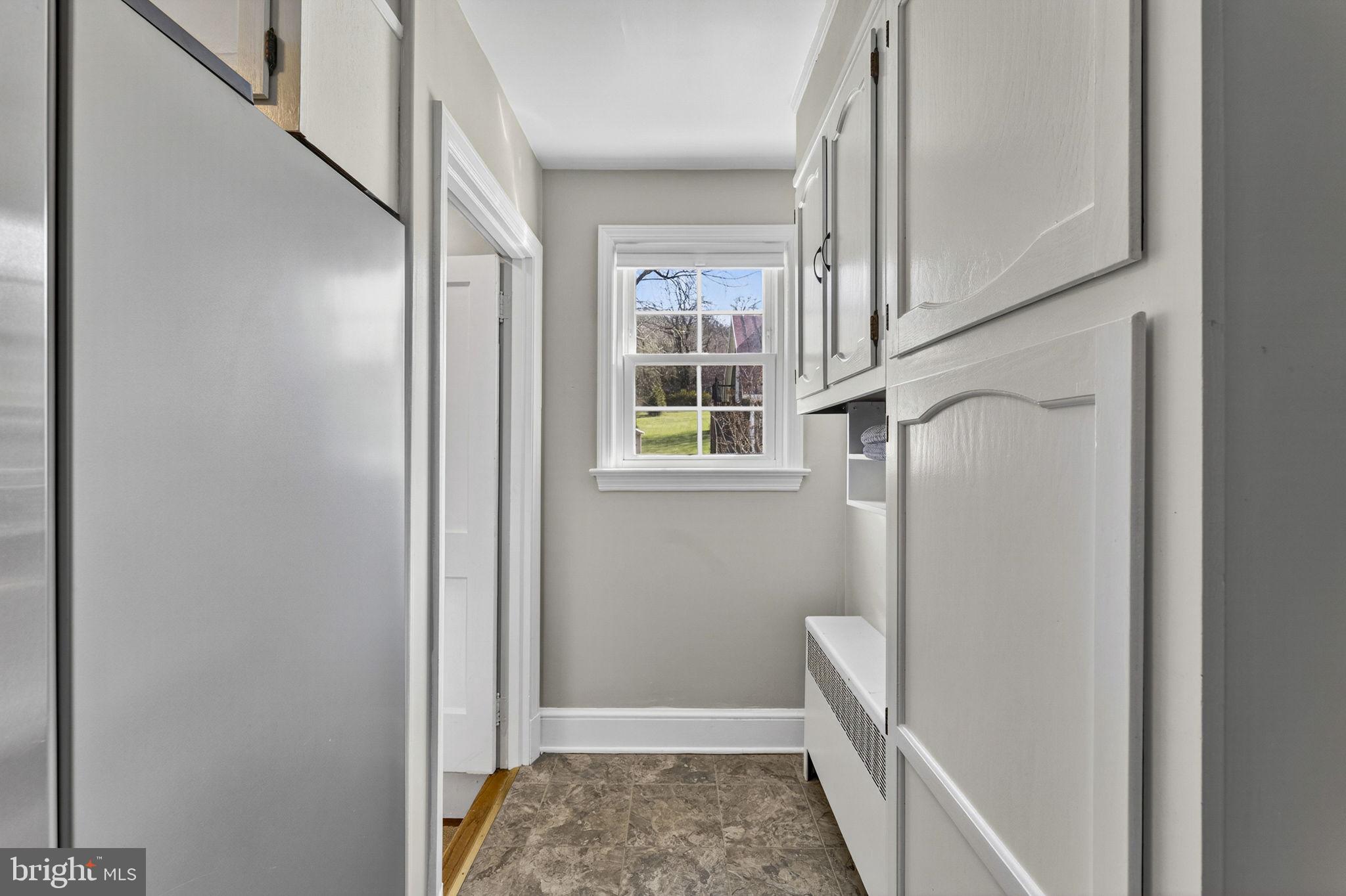 653 Federal Street Paris, VA 20130 - Photo 20 of 64 Landing area at the top of the stairs w/ storage