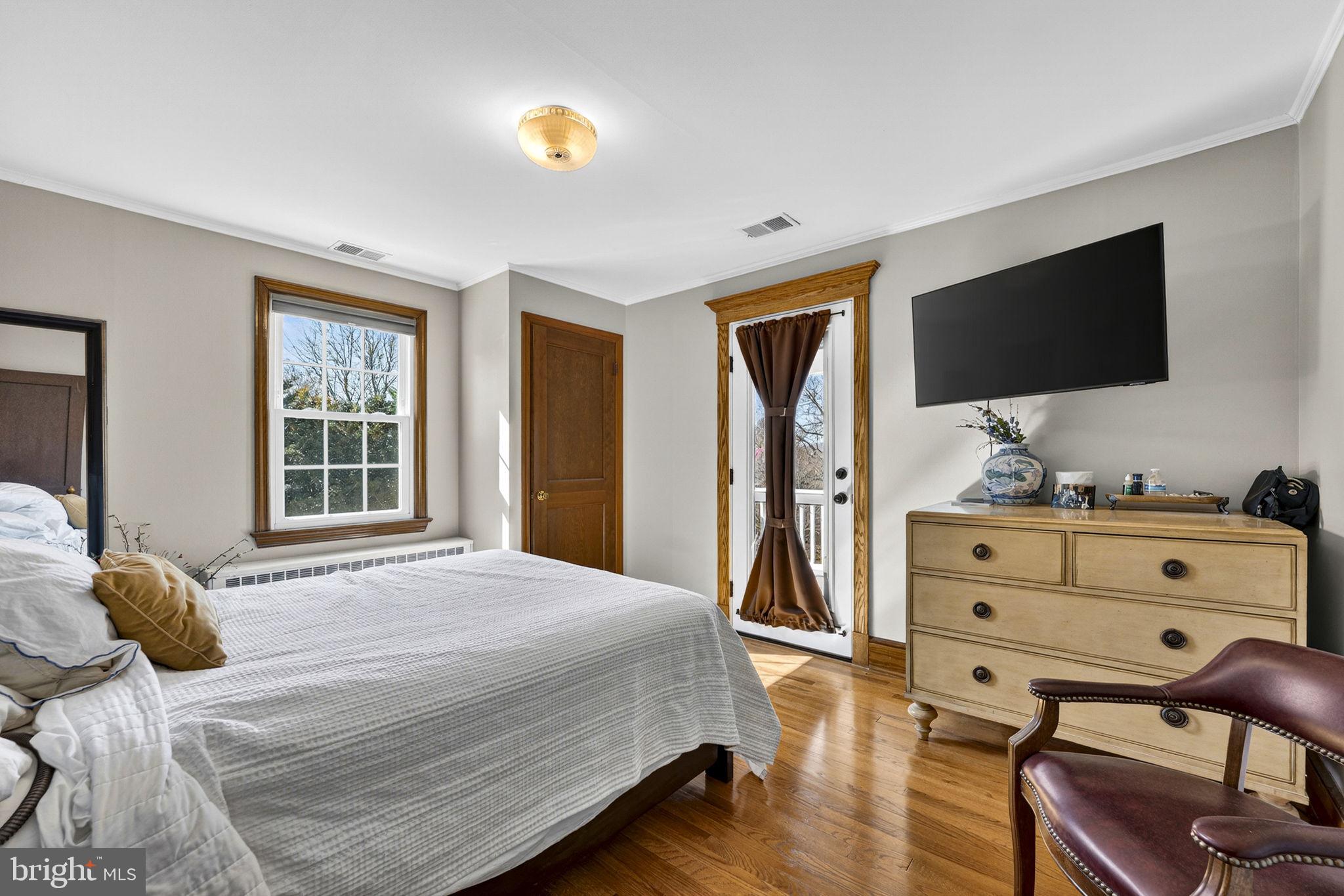 653 Federal Street Paris, VA 20130 - Photo 23 of 64 a bedroom with a bed and flat screen tv