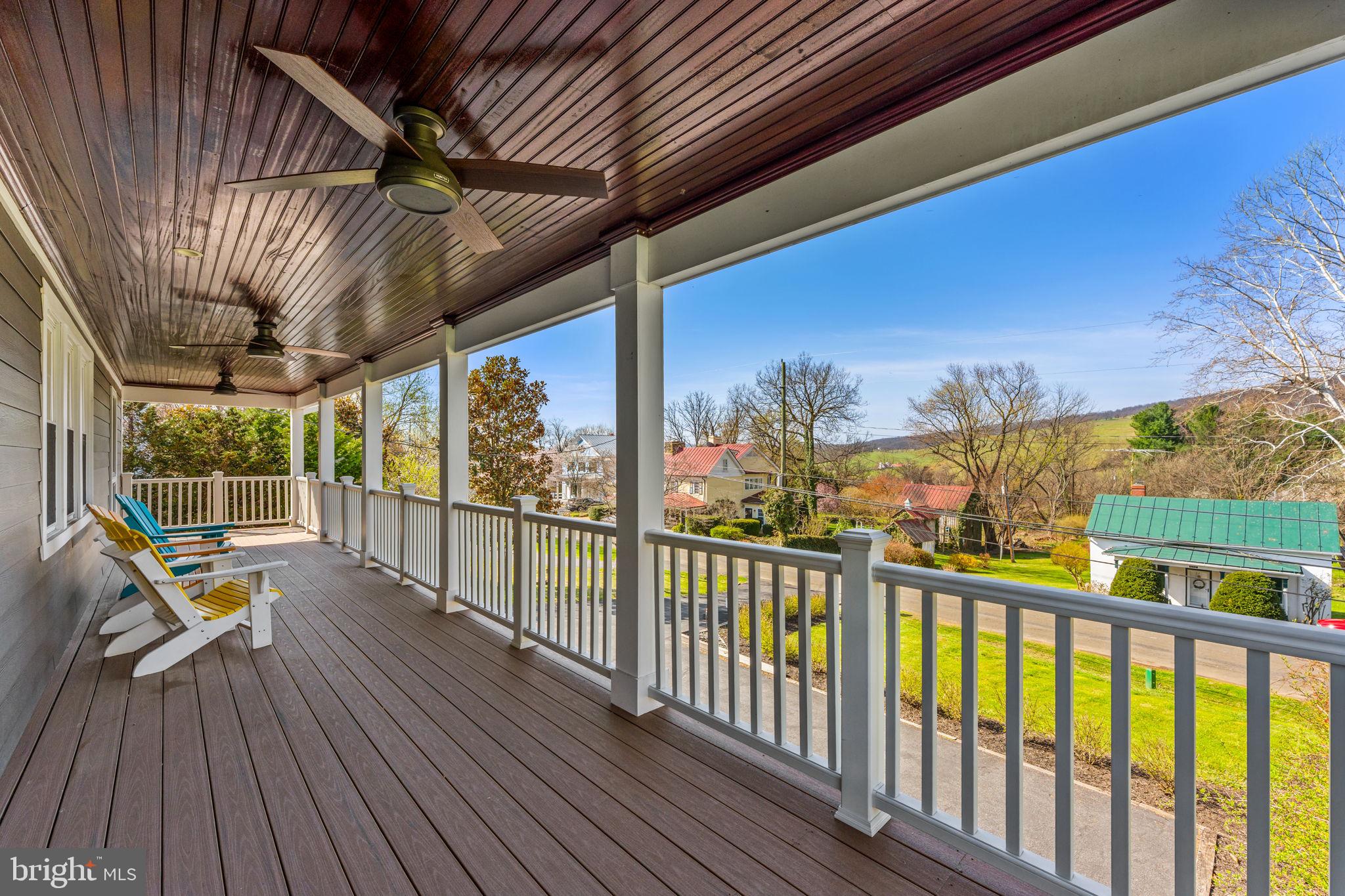 653 Federal Street Paris, VA 20130 - Photo 31 of 64 a view of a balcony with wooden floor and outdoor space