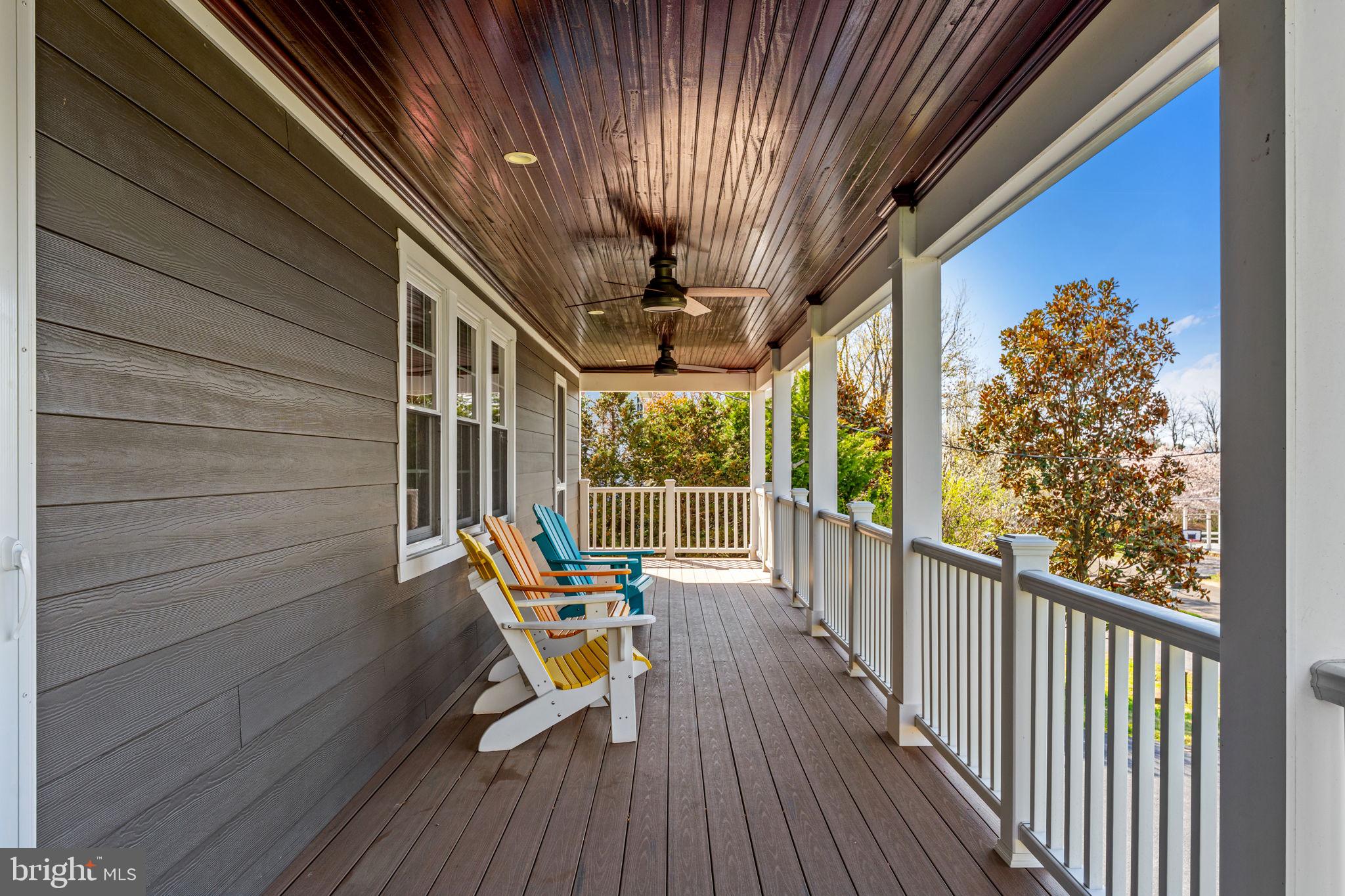 653 Federal Street Paris, VA 20130 - Photo 32 of 64 a view of a porch with furniture and wooden floor