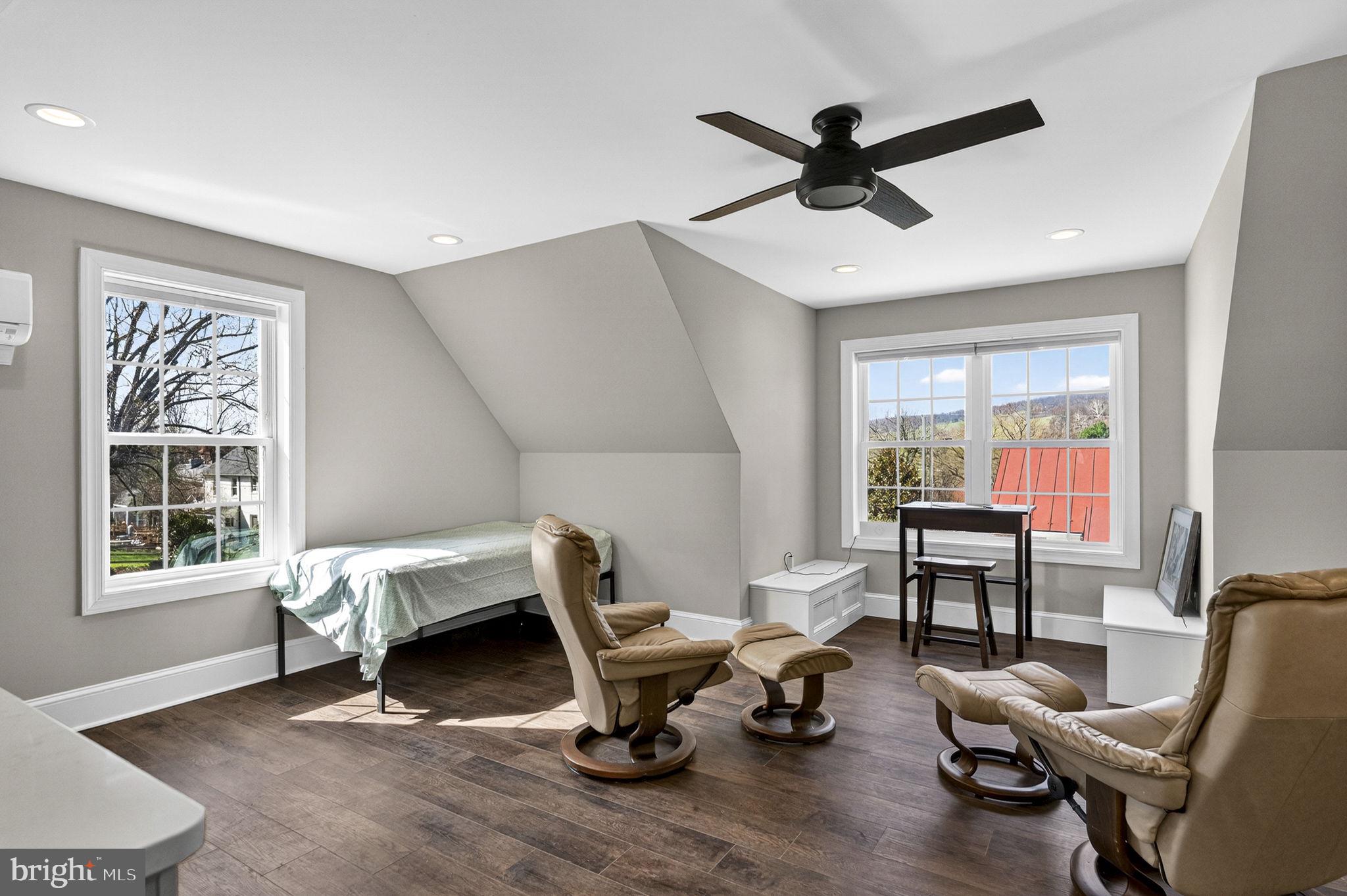 653 Federal Street Paris, VA 20130 - Photo 59 of 64 a workspace with wooden floor and windows