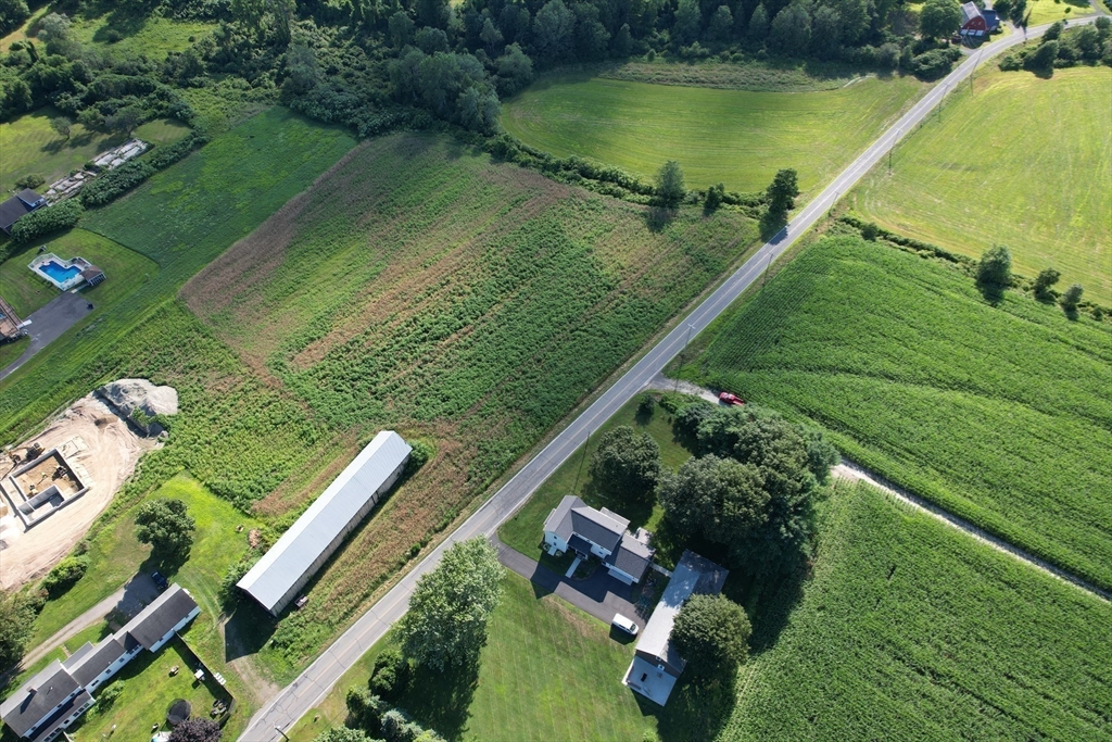 0 Depot Road Hatfield, MA 01038 - Photo 10 of 14 a view of a lake with a yard and large trees