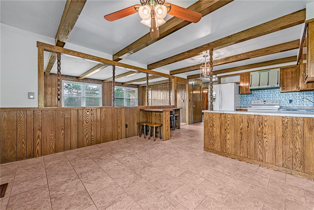 207 Pineslope Road Acme, PA 15610 - Photo 5 of 25 a view of a kitchen with furniture and a window