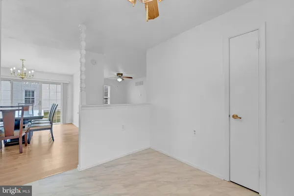 a kitchen with stainless steel appliances granite countertop a sink and dishwasher a stove with wooden floor