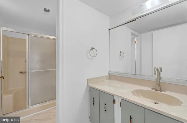 a bathroom with a shower and a toilet