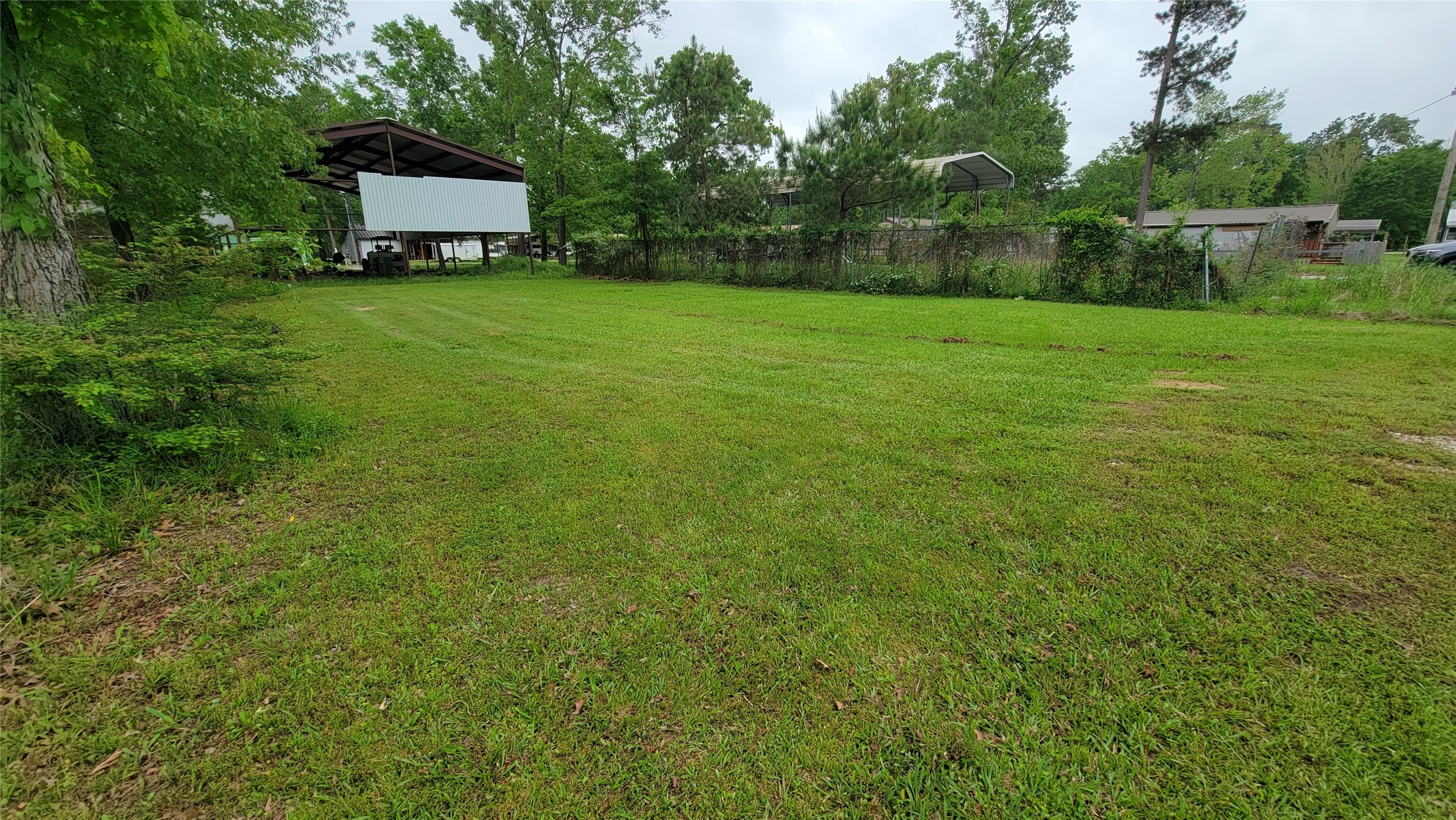 0 Tobago Lane Point Blank, TX 77364 - Photo 5 of 13 View from street (back structure not included).