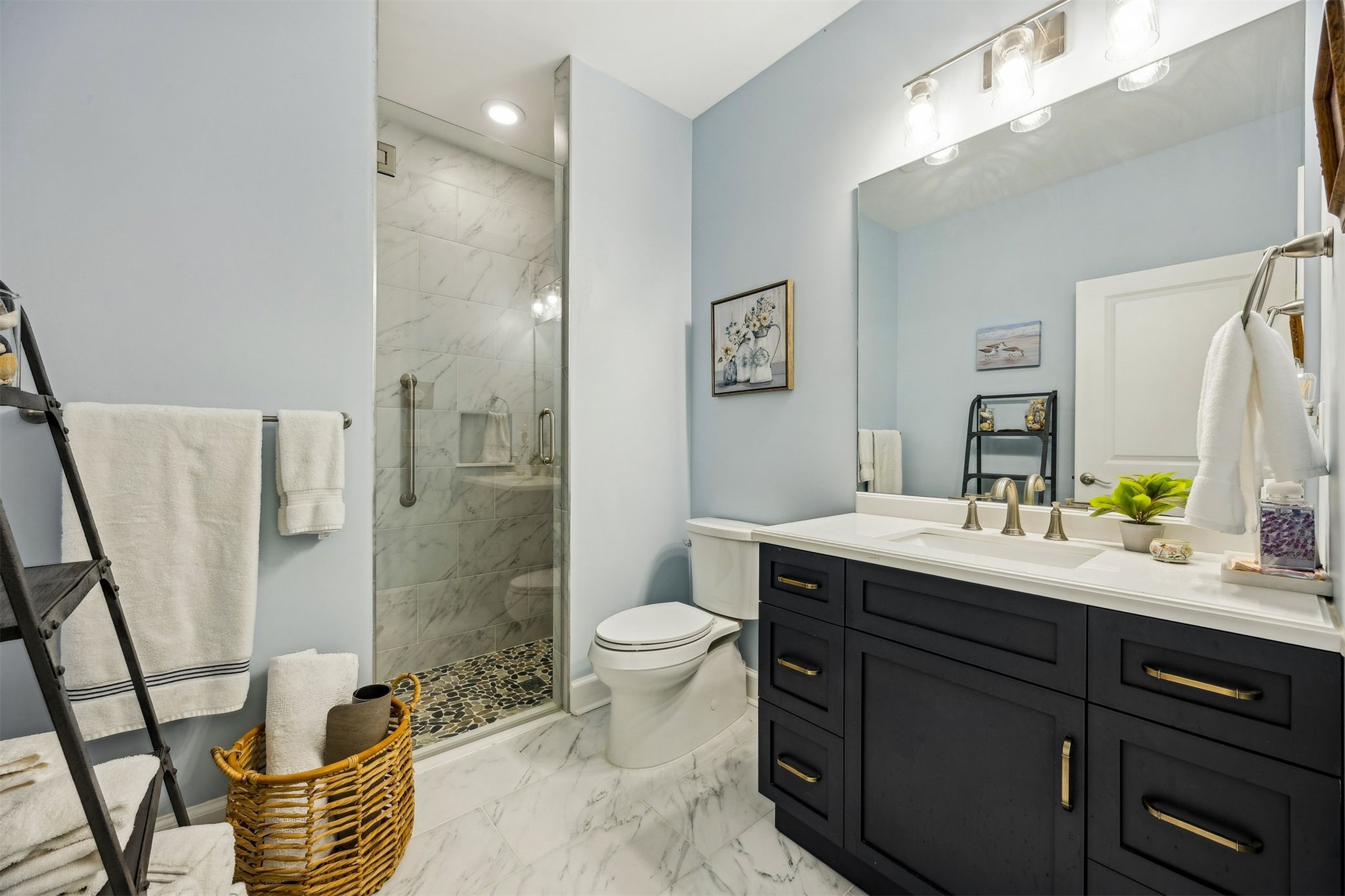 307 Elm Street Fernandina Beach, FL 32034 - Photo 20 of 35 a bathroom with a sink toilet and shower