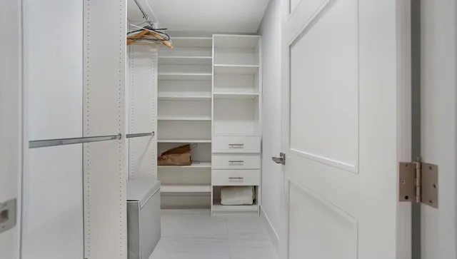 a bathroom with a toilet and a sink