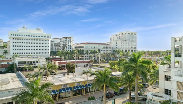a view of city with tall buildings