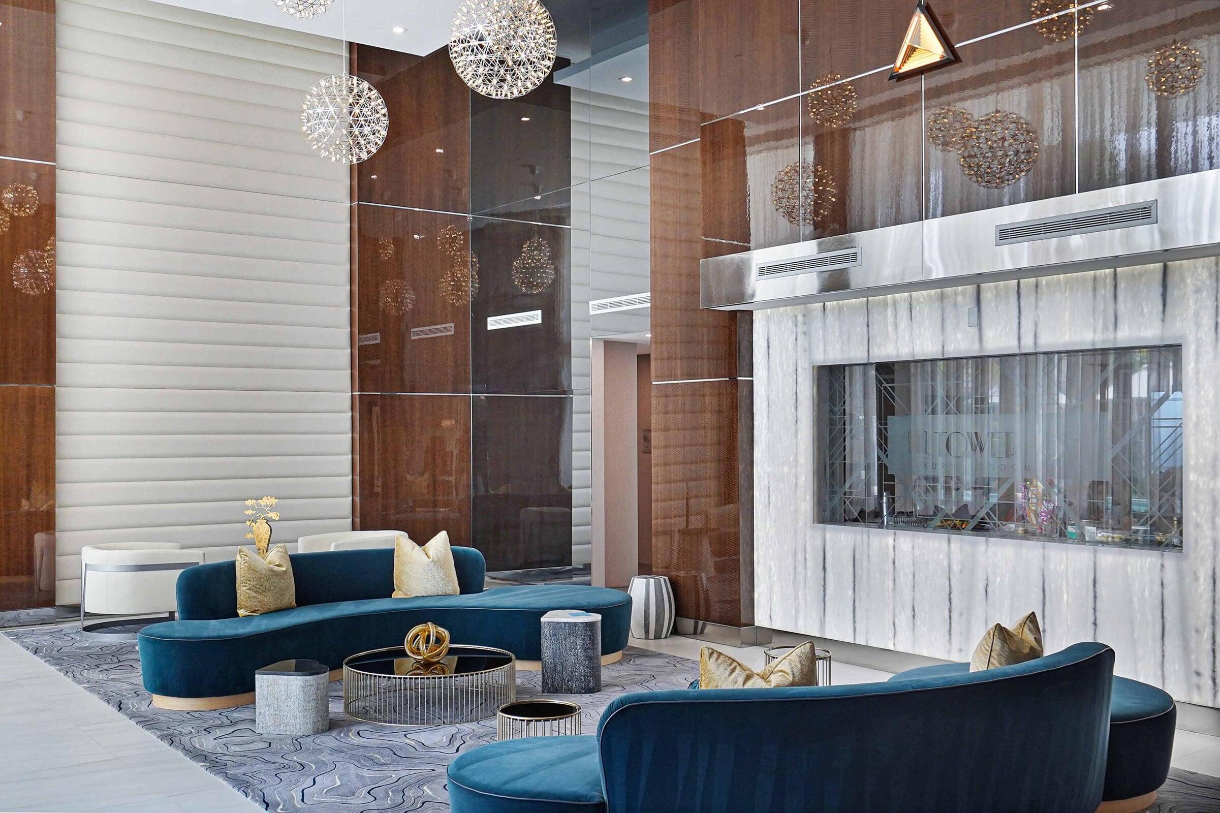 155 East Boca Raton Road, Unit 501 Boca Raton, FL 33432 - Photo 54 of 83 a living room with furniture and a fireplace