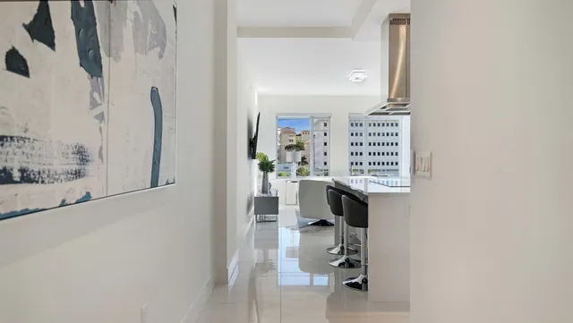 a kitchen with a sink a stove and microwave