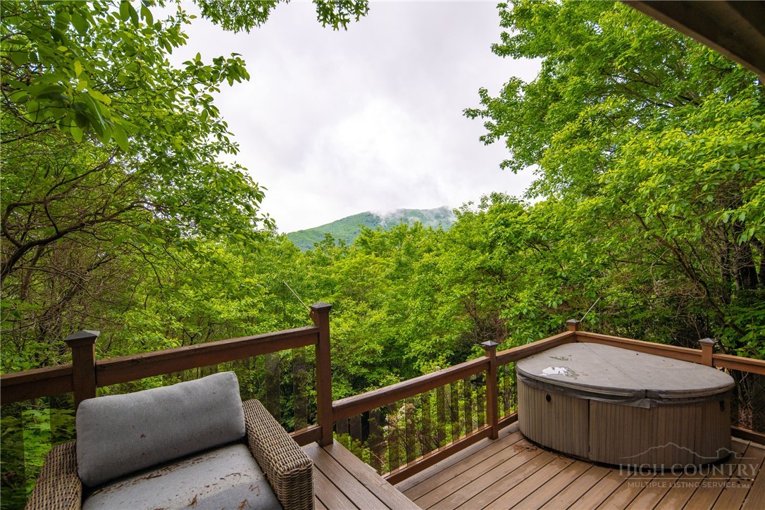 280 Chinkapin Ridge Road Seven Devils, NC 28604 - Photo 27 of 40 a view of a two chairs in the roof deck