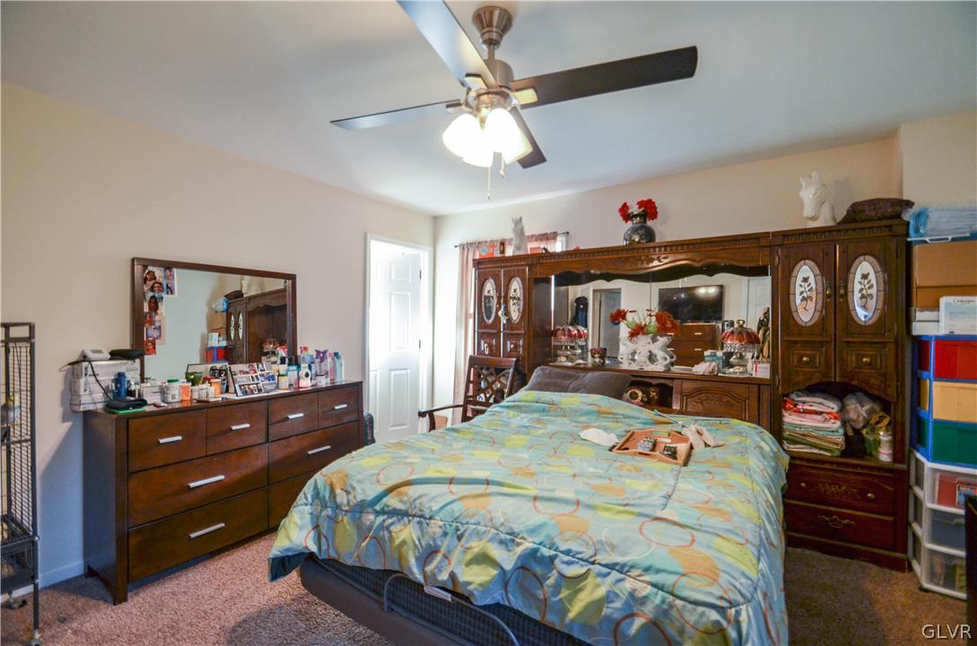 101 Coolbaugh Road East Stroudsburg, PA 18302 - Photo 12 of 24 a bedroom with a bed and a mirror on dresser