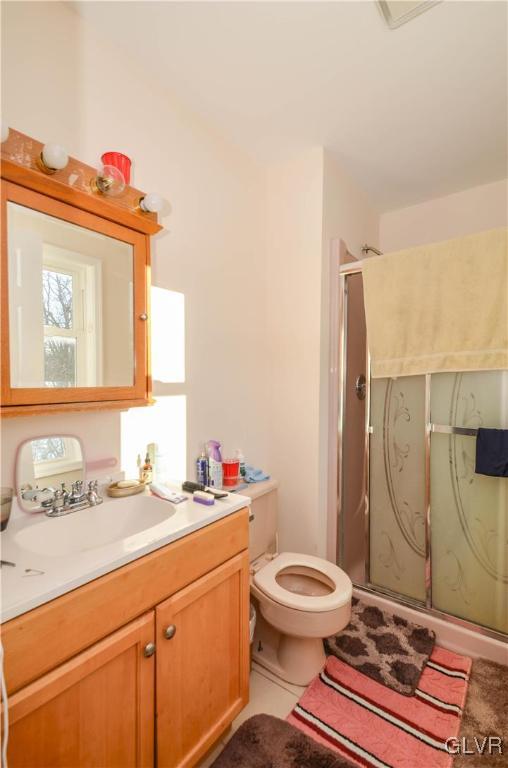 101 Coolbaugh Road East Stroudsburg, PA 18302 - Photo 13 of 24 a bathroom with a toilet sink and mirror