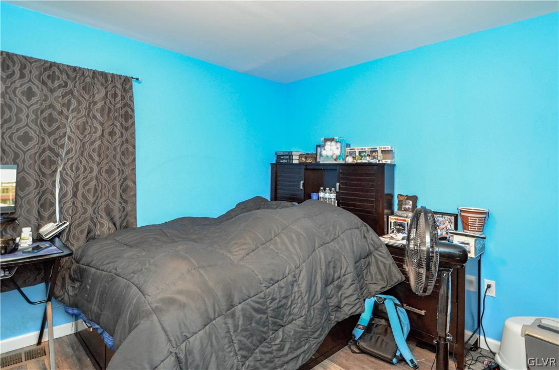 101 Coolbaugh Road East Stroudsburg, PA 18302 - Photo 15 of 24 a bedroom with a bed and a bookshelf