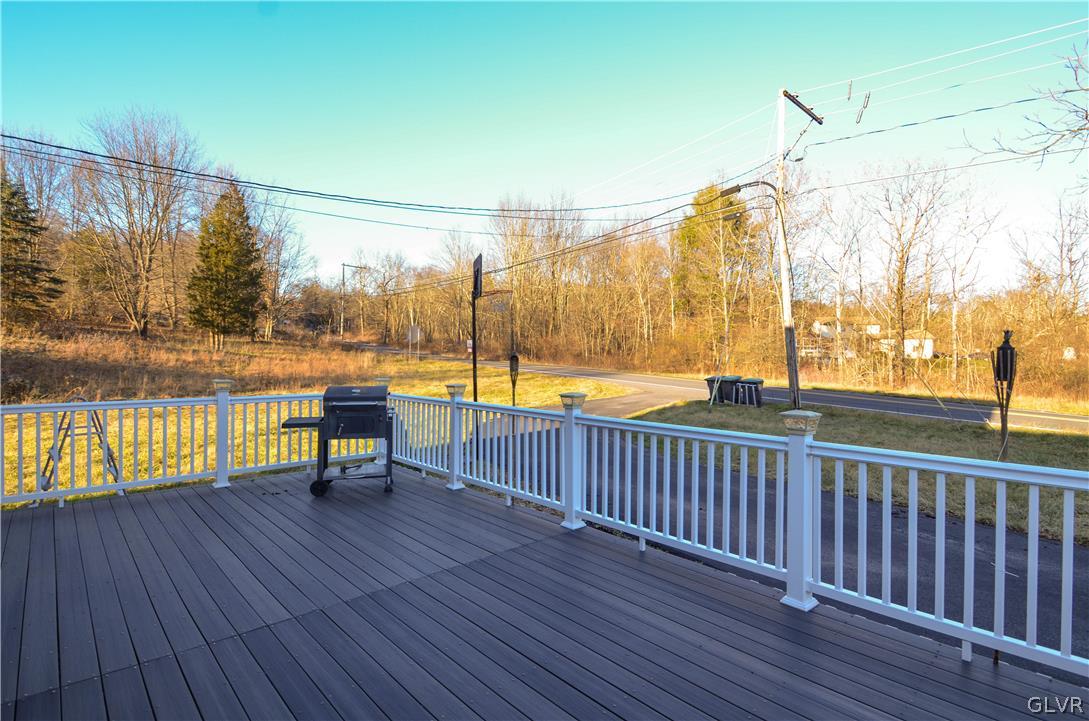 101 Coolbaugh Road East Stroudsburg, PA 18302 - Photo 19 of 24 a view of a deck with wooden floor and outdoor seating