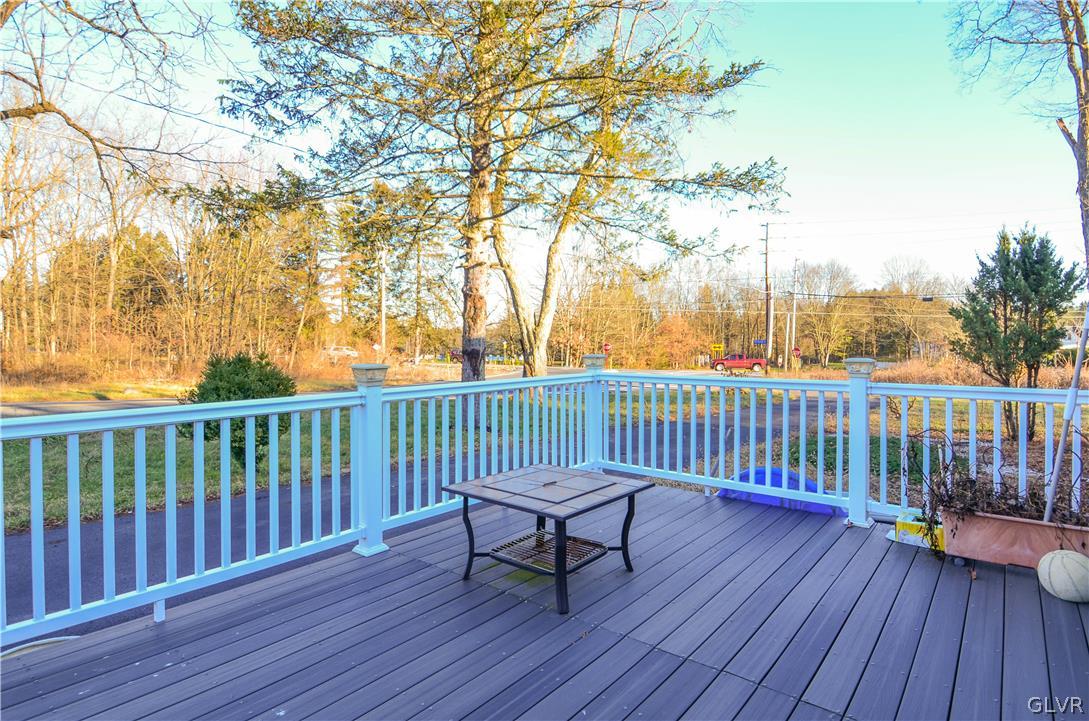 101 Coolbaugh Road East Stroudsburg, PA 18302 - Photo 20 of 24 a view of a wooden roof deck with a bench and wooden floor