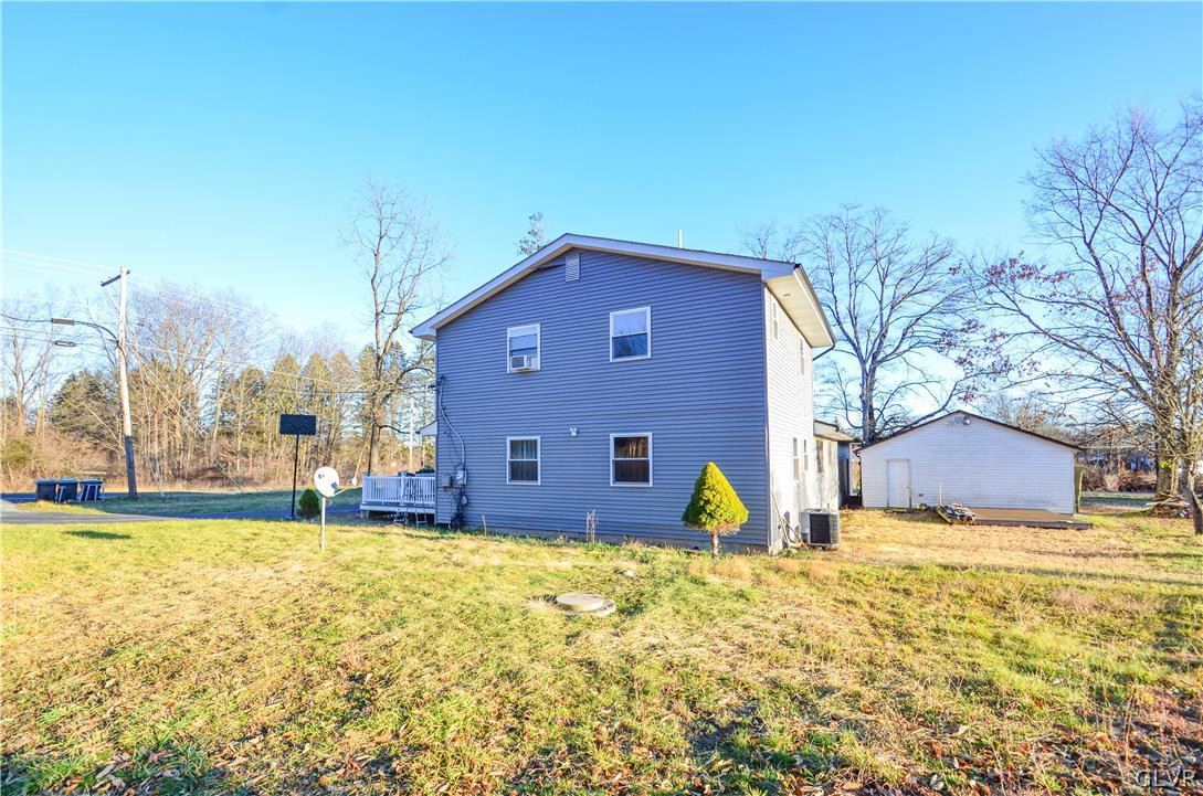 101 Coolbaugh Road East Stroudsburg, PA 18302 - Photo 21 of 24 a view of a house with a yard