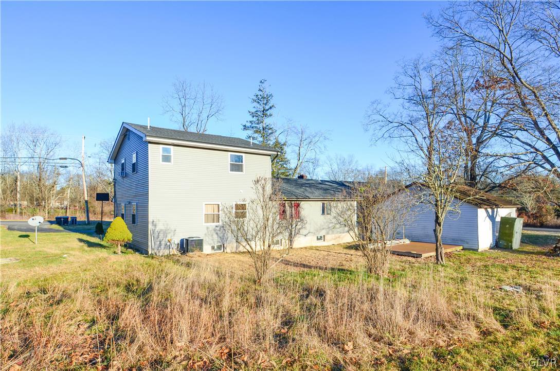 101 Coolbaugh Road East Stroudsburg, PA 18302 - Photo 22 of 24 a view of a house with a yard covered in snow