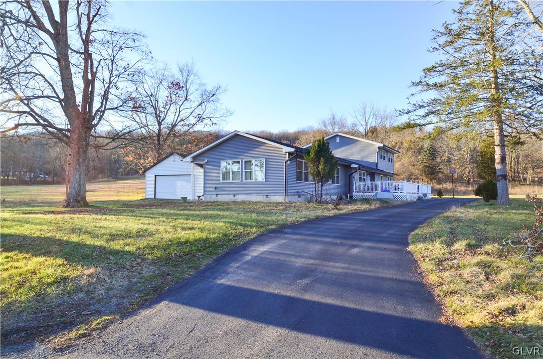 101 Coolbaugh Road East Stroudsburg, PA 18302 - Photo 24 of 24 a front view of a house with garden