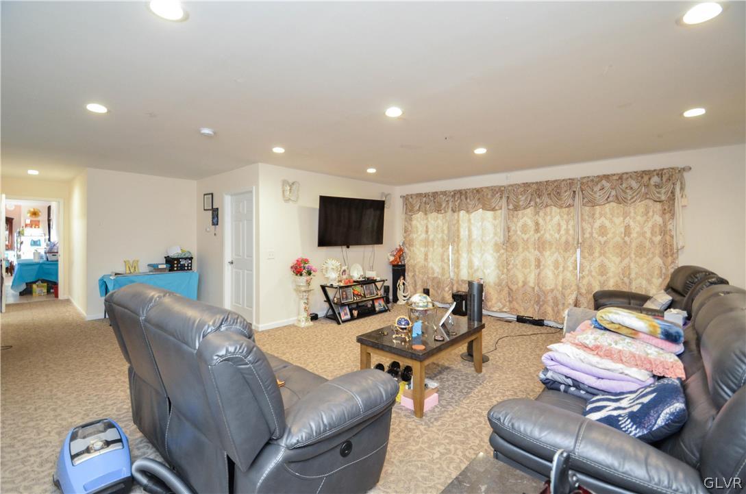 101 Coolbaugh Road East Stroudsburg, PA 18302 - Photo 3 of 24 a living room with furniture or outdoor view and a large window
