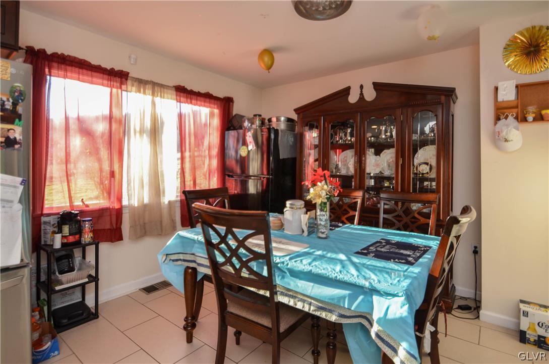 101 Coolbaugh Road East Stroudsburg, PA 18302 - Photo 6 of 24 a view of a dining room with furniture and window