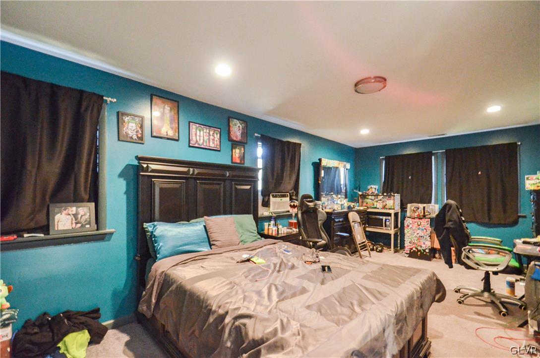 101 Coolbaugh Road East Stroudsburg, PA 18302 - Photo 8 of 24 a bed room with a bed and a chair