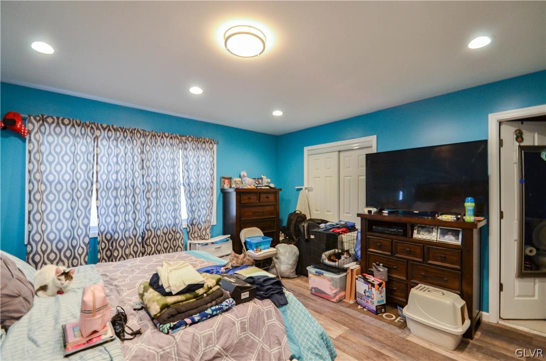 101 Coolbaugh Road East Stroudsburg, PA 18302 - Photo 10 of 24 a bed room with a bed and a flat screen tv