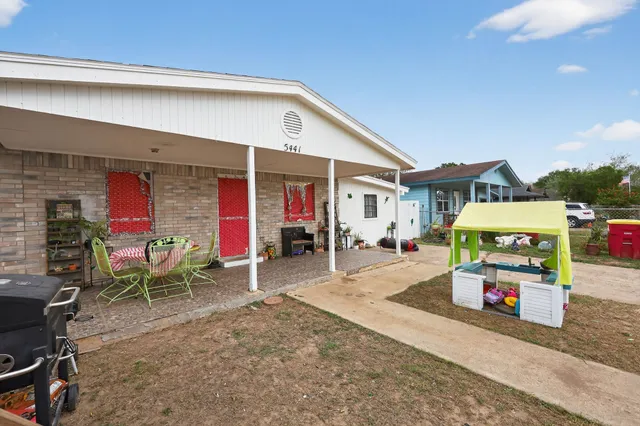 a view of a children toys back of the house