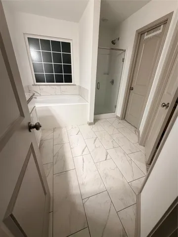 a view of empty room with windows